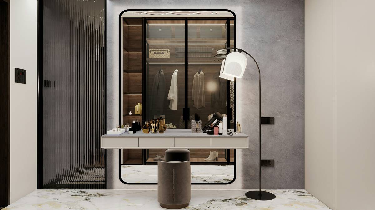 chic vanity with organized drawers, soft lighting, and a framed mirror